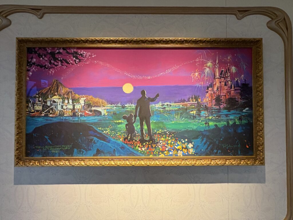 ウォルト・ディズニーとミッキーの後ろ姿